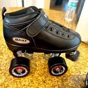Riedell kids roller skates size 1 youth. Only used at the skating ring floor!